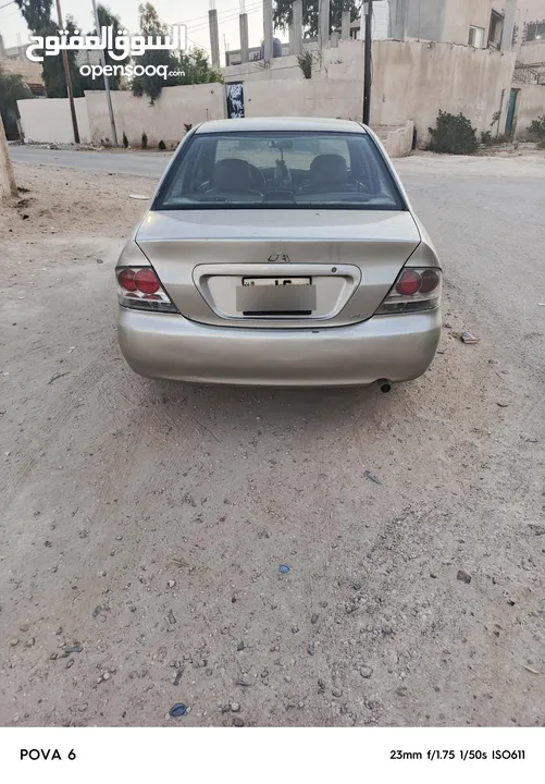 لانسر موديل 2005 قير عادي متور 1300