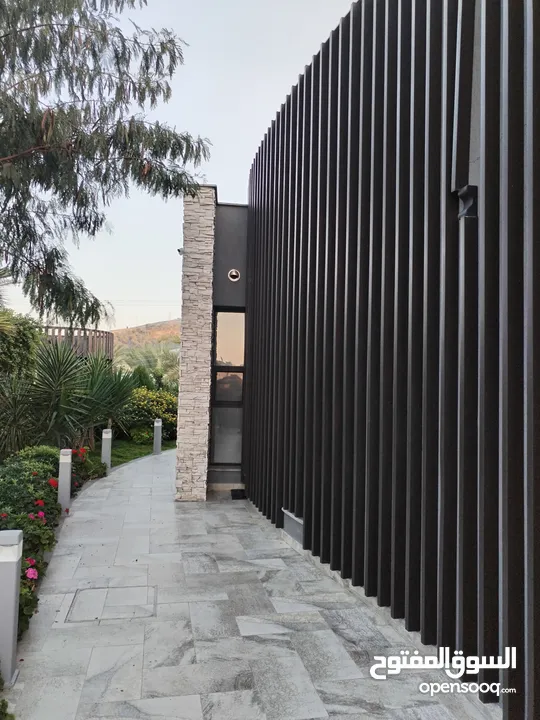 من أجمل مزارع تل الرمان بالقرب من مطعم خيل و ليل مزروعة مميزة تصميم عصري