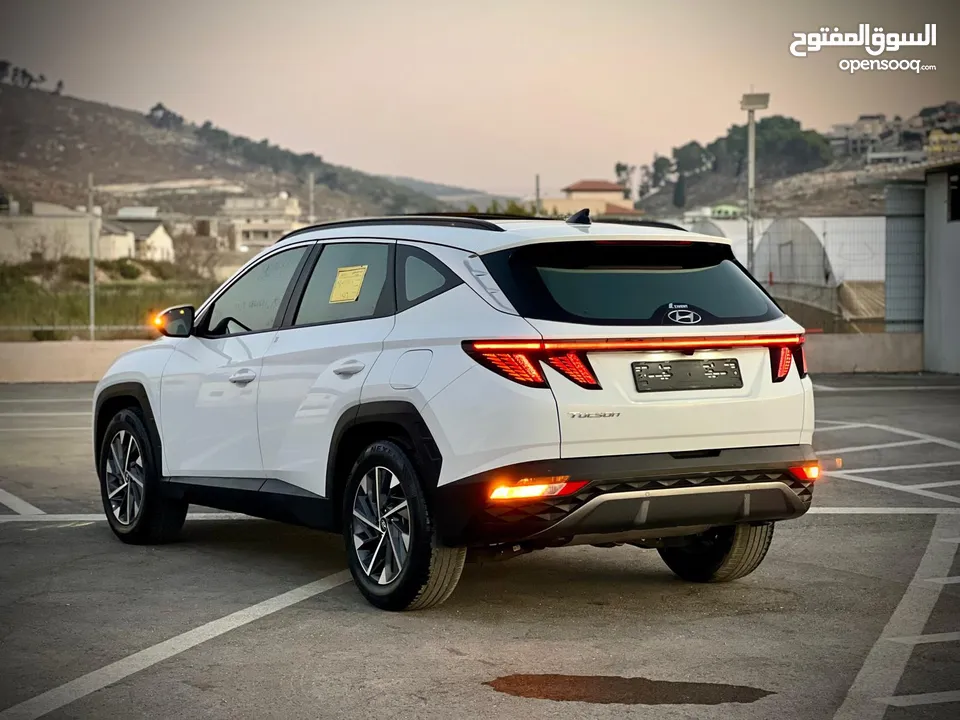 هونداي توسان 2023/ فل الفل فتحة سقف بانوراما  2x4 ///240Hp بنزين + كهرباء  ( Haybrid) 1600cc