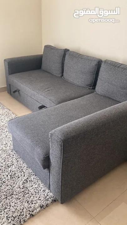 L shaped sofa bed - grey