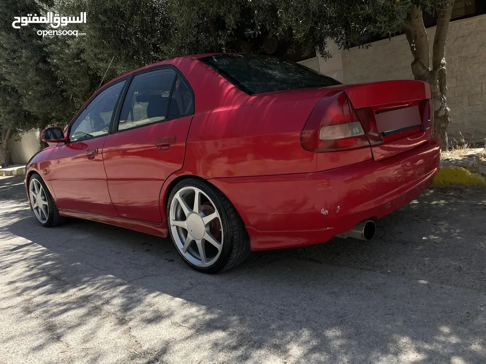 ميتسوبيشي لانسر 1996 جير عادي للبيع فوري والشرا ما بقصر معه