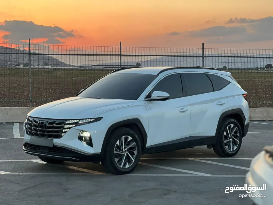 هونداي توسان/2022 فل الفل بدون فتحة سقف  2x4 ///240Hp بنزين + كهرباء  ( Haybrid) 1600cc