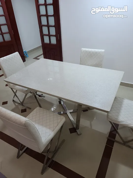 Dinning table (Seater) with marble/stone TOP. Great looks and sturdy. Very cheap price