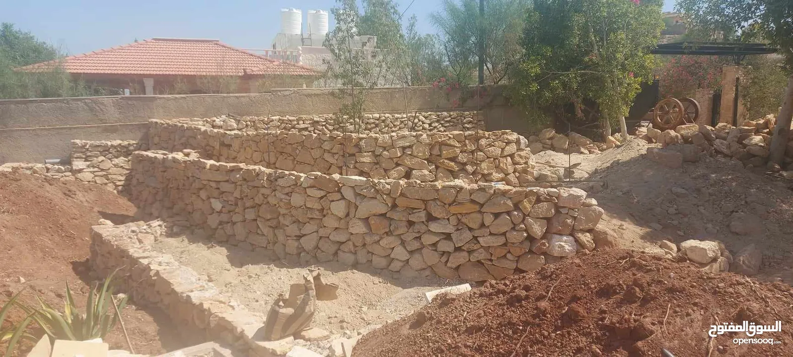 حيدر استصلاح اراضي بناء سناسل بناء سلاسل تشييك مزارع تكحيل حجر تجريف اراضي بناء شاليهات وبيوت ريفيه