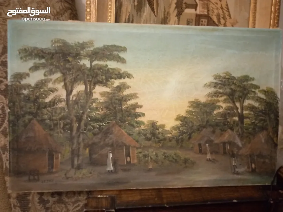 لوحات  رسم زيتي.. وتطريز