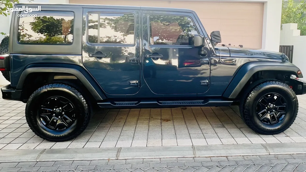 Jeep Wrangler JK Willys, 2017, GCC Spec, 4 Door, 82,800 Kms, Dark Grey, 9200 RO. See in Al Mouj.