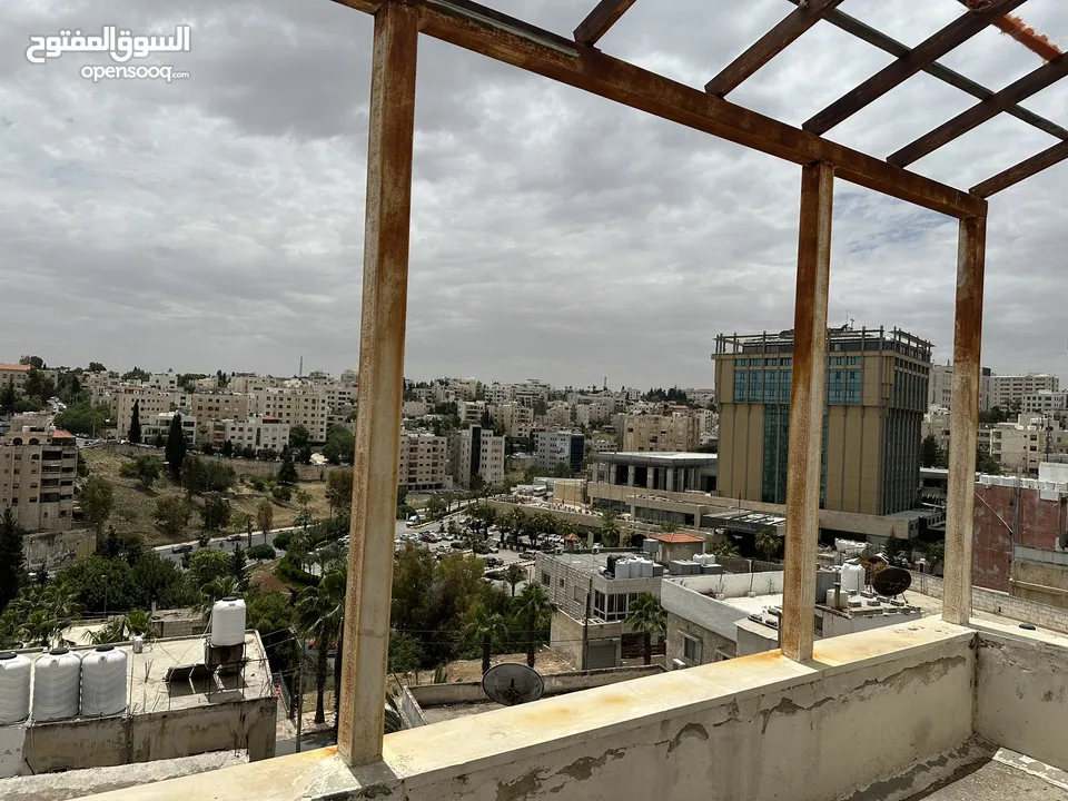 عمارة 8 شقق في العبدلي بجانب البوليفارد بدخل ممتاز للبيع بسعر الارض