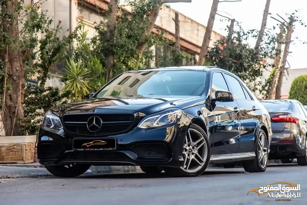 Mercedes E200 Avantgarde Amg kit 2015  السيارة وارد و بحالة الوكالة