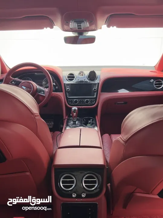 WHITE COLOUR EXTERIOR BENTLEY BENTAYGA WITH COOL RED INTERIOR