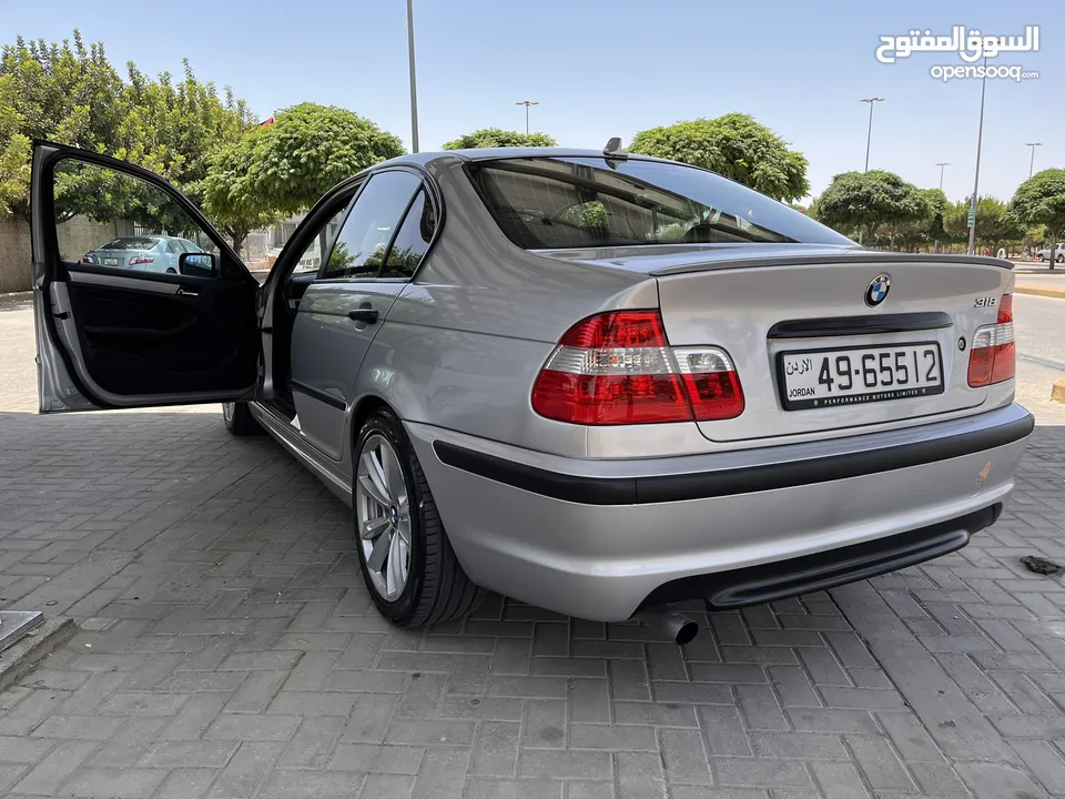 BMW 318 2003 بي ام 318 2003  بحالة الوكالة