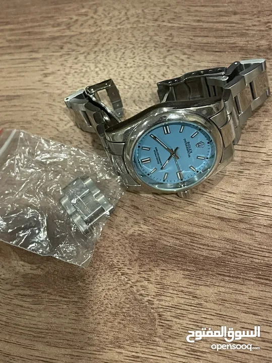 ساعة رولكس وساعة اوميغا ( ازرق ) كالجديد
