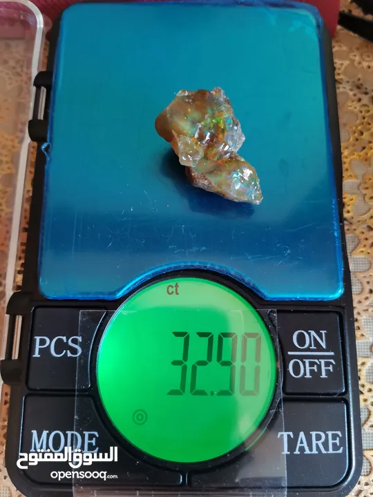 حجركريم اوبال ملتي كلر ناري Opal gemstone