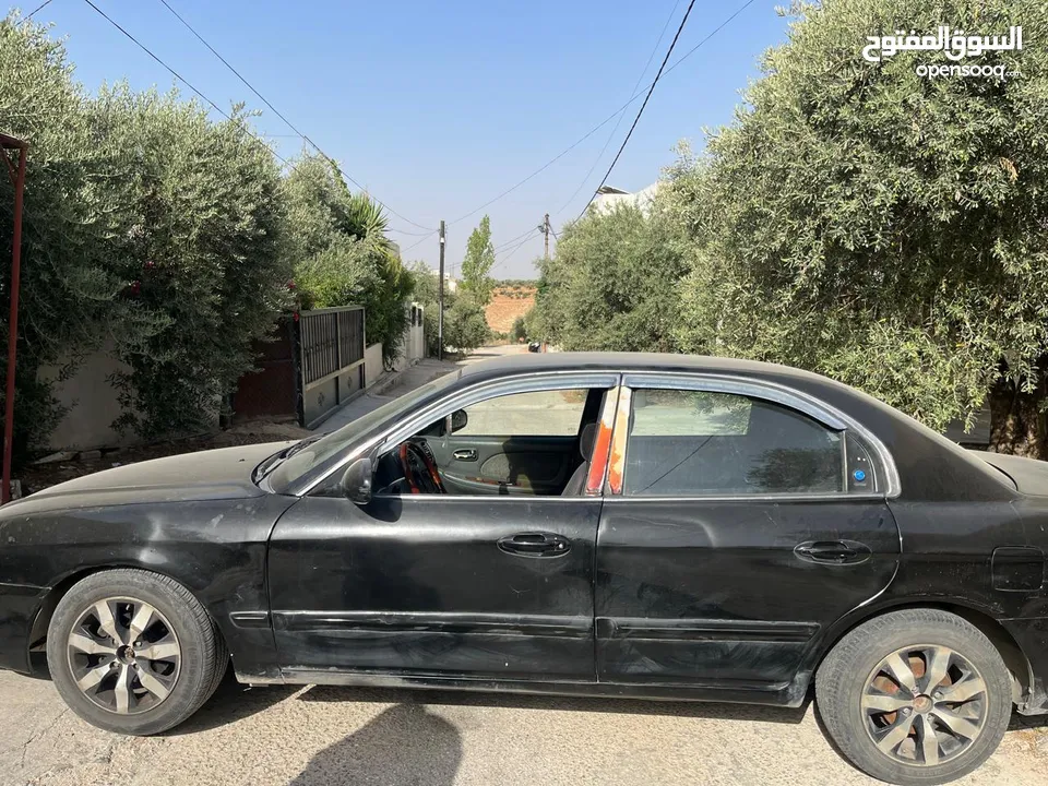 كيا اوبتيما 2002