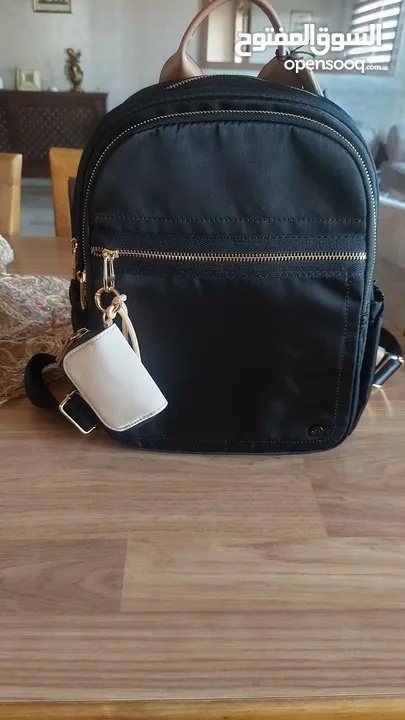 شنتة جديدة ضد الماء backpack ماركة PARFOIS مع جزدان لون ابيض حجم وسط