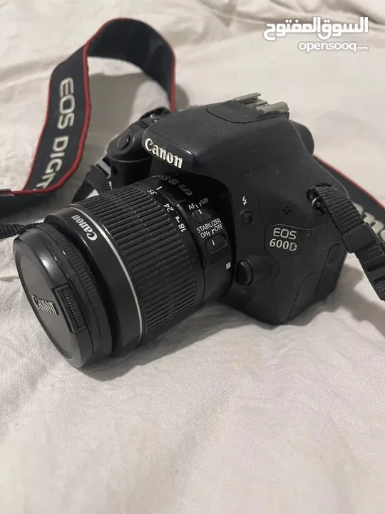 كاميرة Canon 600d مع عدسة 58mm ومع البطارية وشاحن والشنطة   مستعملة استعمال خفيف