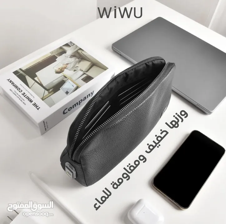 شنطة يد مميزة من براند WIWU جلدها مرتب وعليها رقم سري بكفالة الوكيل الحصري