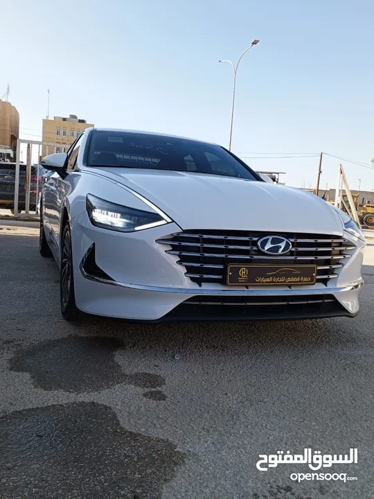 SONATA HYBRID 2020 ابيض لؤلؤي كوري  عداد 32 الف كيلو