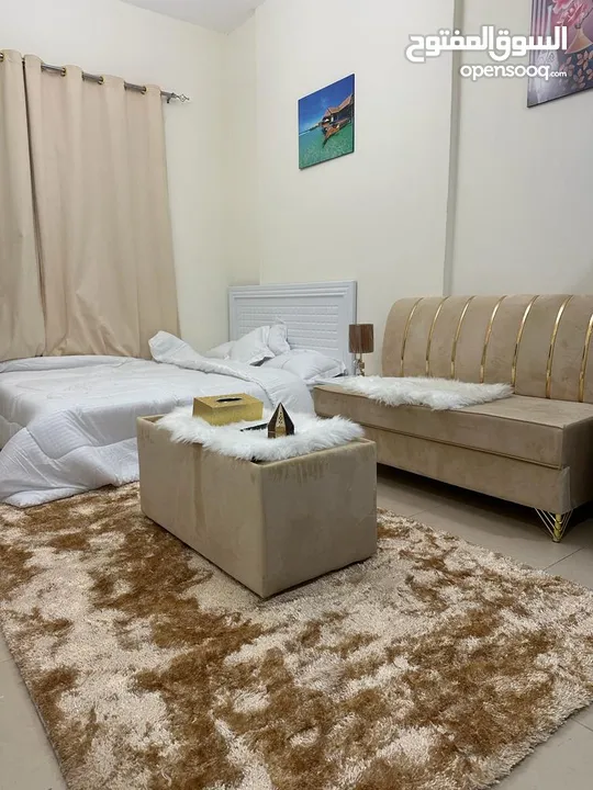For rent in Ajman, studio in Al Yasmeen Towers, opposite Ajman City Centre, new furniture, easy exit