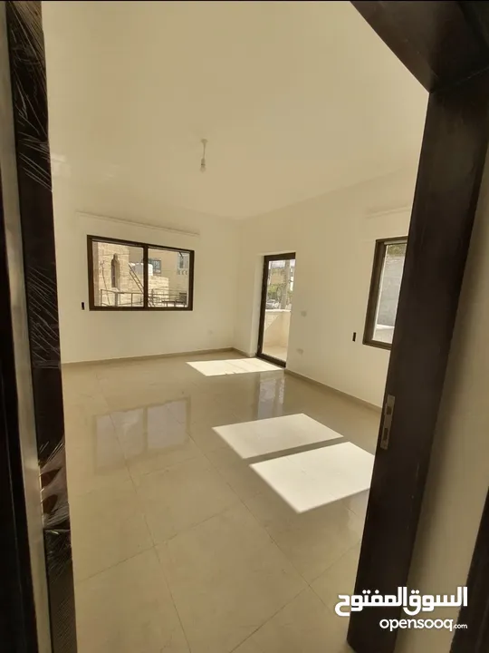 عماره جديده/4 شقق طابقيه للبيع