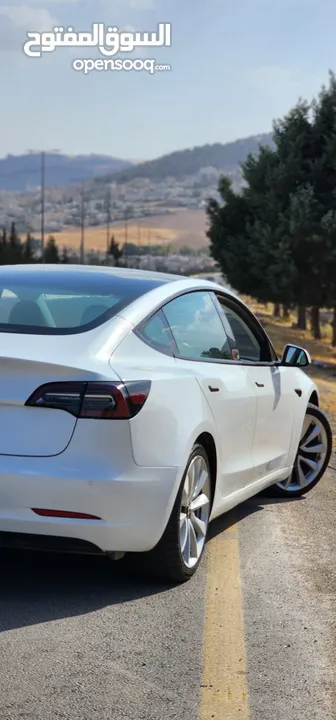 Tesla Model 3 Standerd Plus 2022 ابيض وداخليه ابيض جمرك جديد شهر 12‎ بسعر 20 الف بدون الرقم