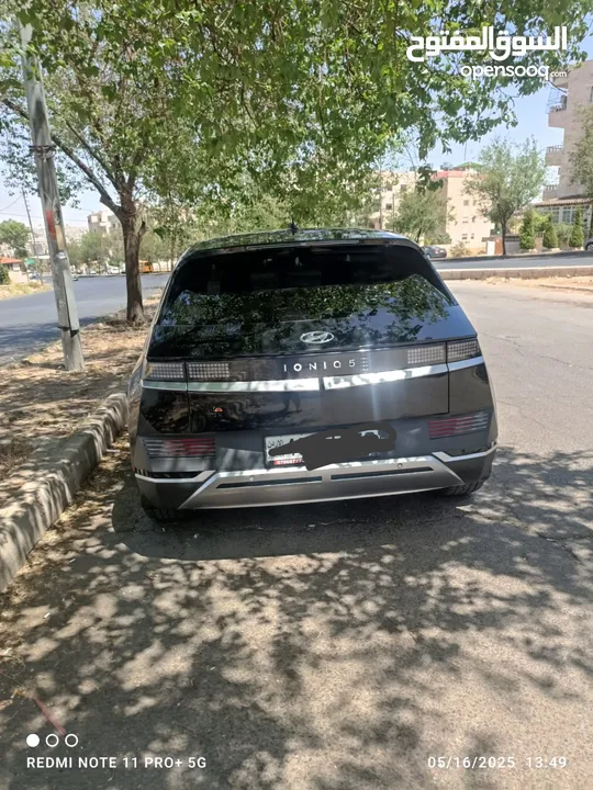 سياره موديل 2022 ايونك 5 كهربائيه لون اسود ميتاليك دفع رباعي اكبر بطاريه تمشي فوق 550 كيلو سبعه جيد