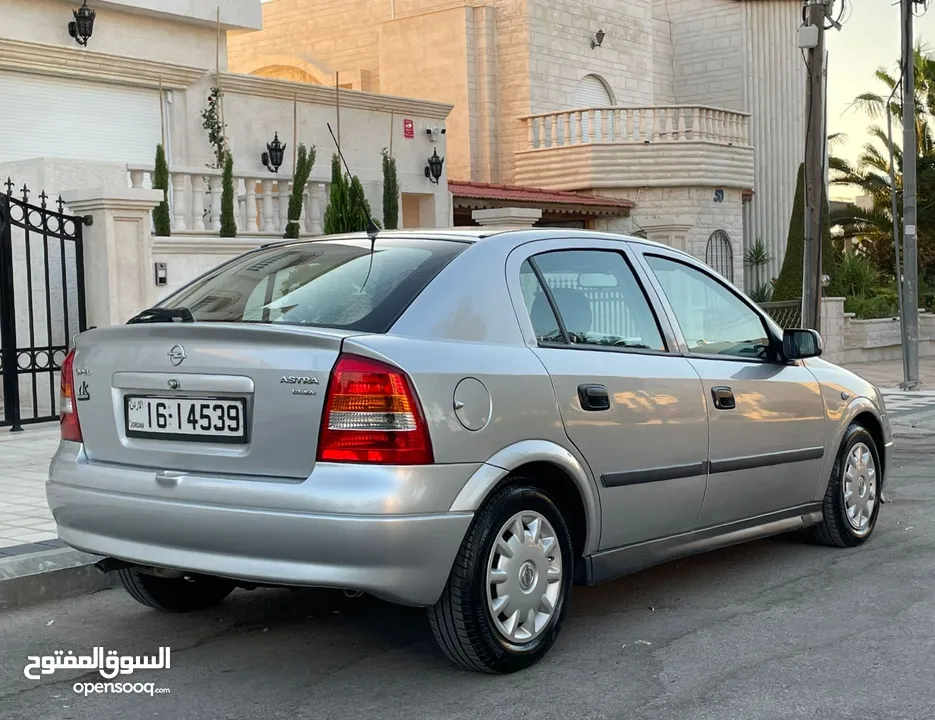 ‎أوبل استرا موديل 2001  وارد الوكالة ومالك واحد فقط من الشركة عداد 100الف كيلو فقط