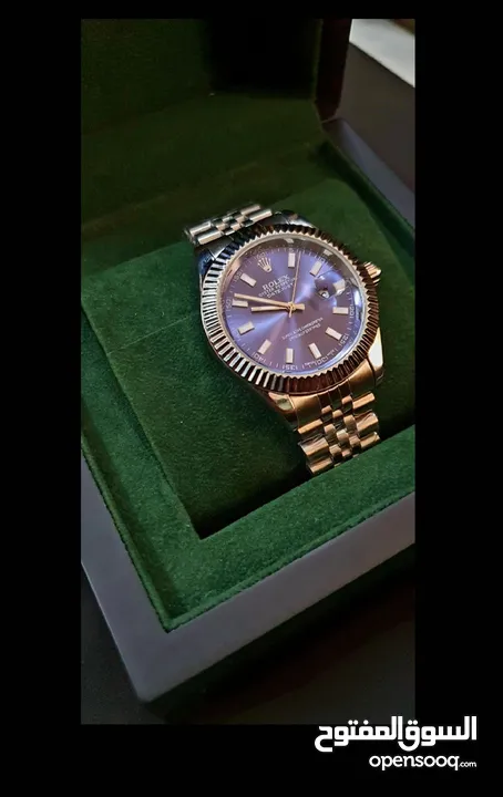 ساعة ROLEX رجالية باللون الأزرق و المعدن + علبة و كيس ROLEX و قابل للتفاوض