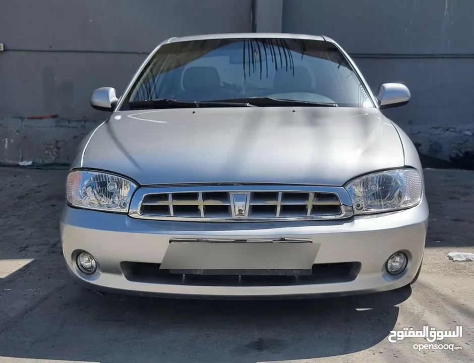 كيا سبيكترا 2001 بسعر 2400 جير عادي سياره نظيفه جدا  kia spectra 2001