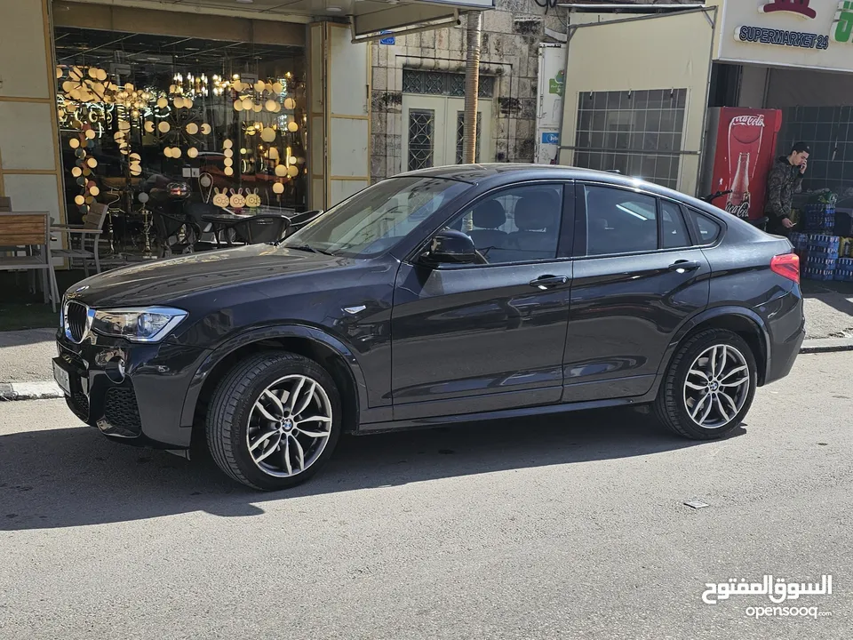 BMW-X4M(FULL OPTION) FULL WHEEL   TWIN TURBO-V6 ENGINE , DRIVE(4x4) استيراد ألماني ، يد اولا .