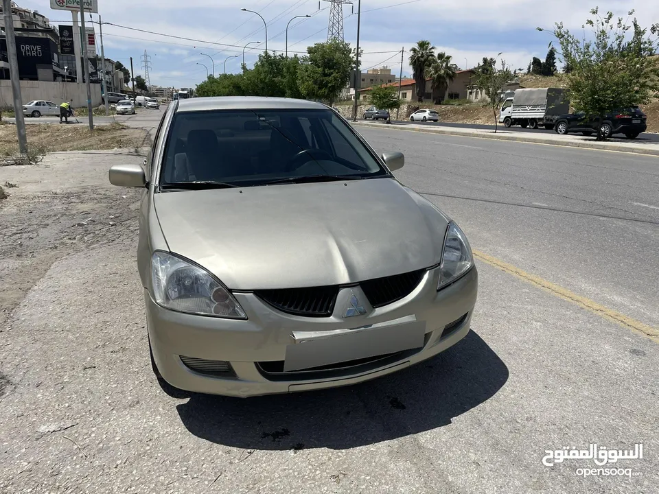 لانسر 2004 للبيع