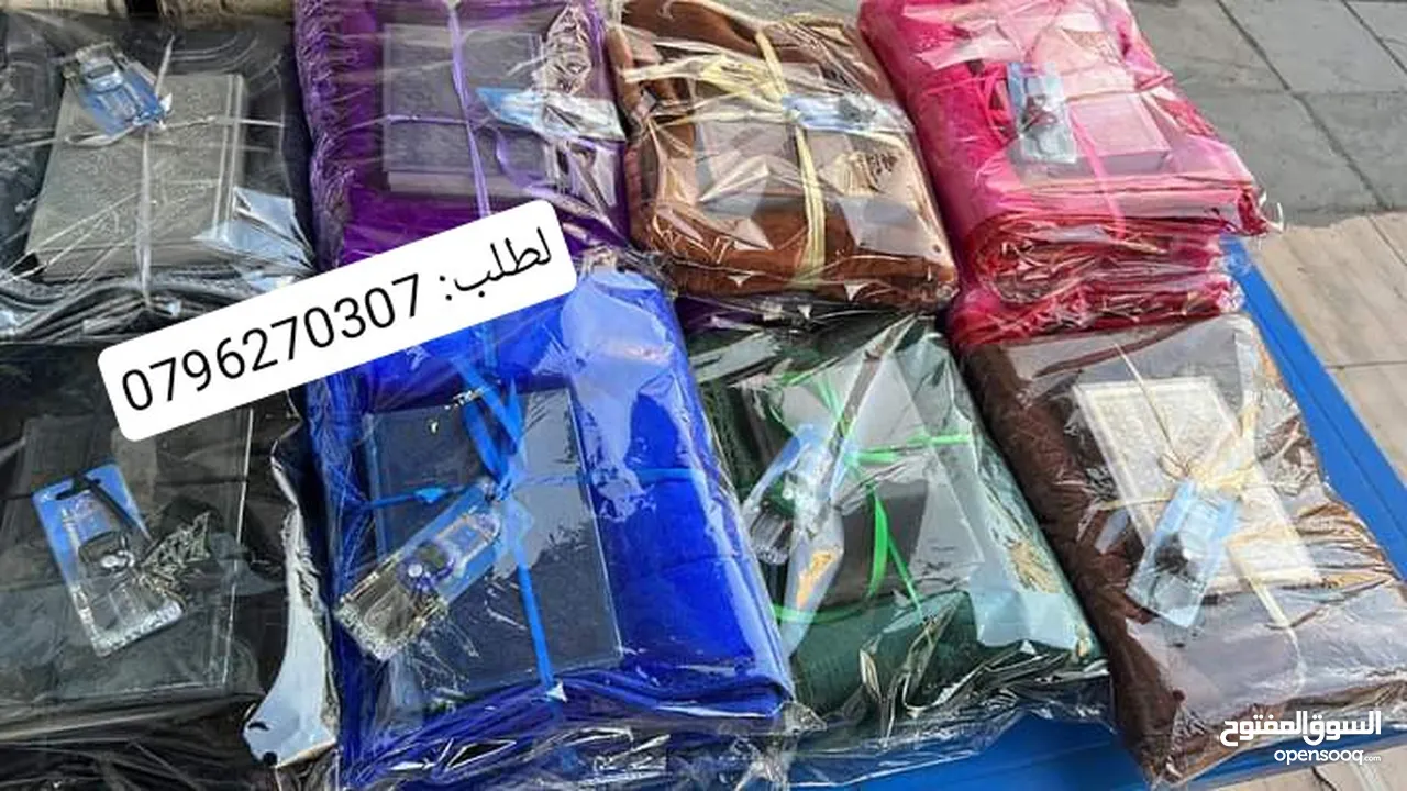 كتب قرآن شاهد قبر ونسخ مجلات وكتب وتغليف كتب صناعة سواري أعلام