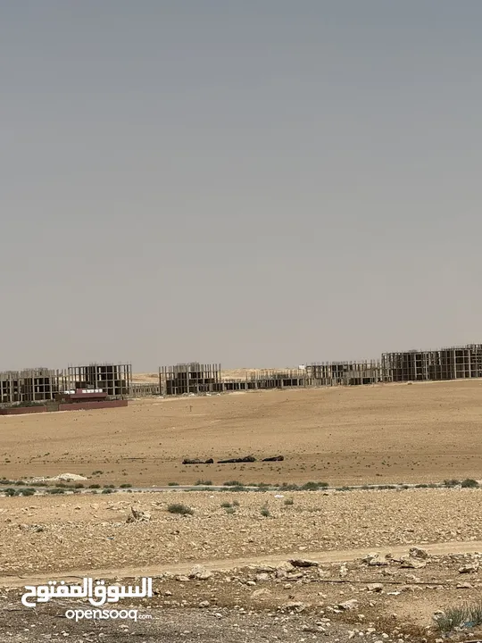ارض في الجيزه على شارعين مقابل مجمع الدوائر