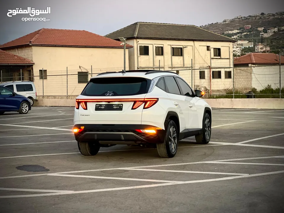 هونداي توسان 2023/ فل الفل فتحة سقف بانوراما  2x4 ///240Hp بنزين + كهرباء  ( Haybrid) 1600cc