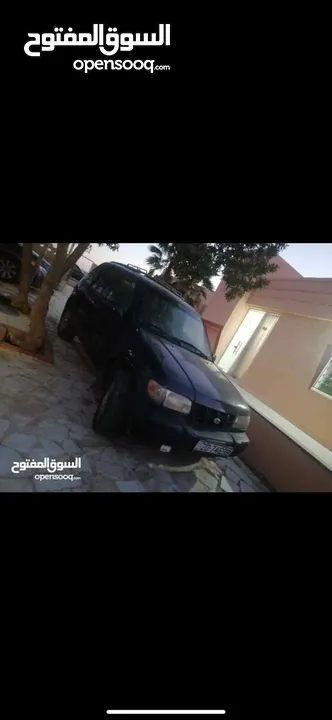 كيا سبورتج 2002