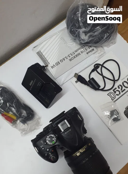 Heavy Duty Nikon D5200 DSLR barely used will all equipment for 200 only