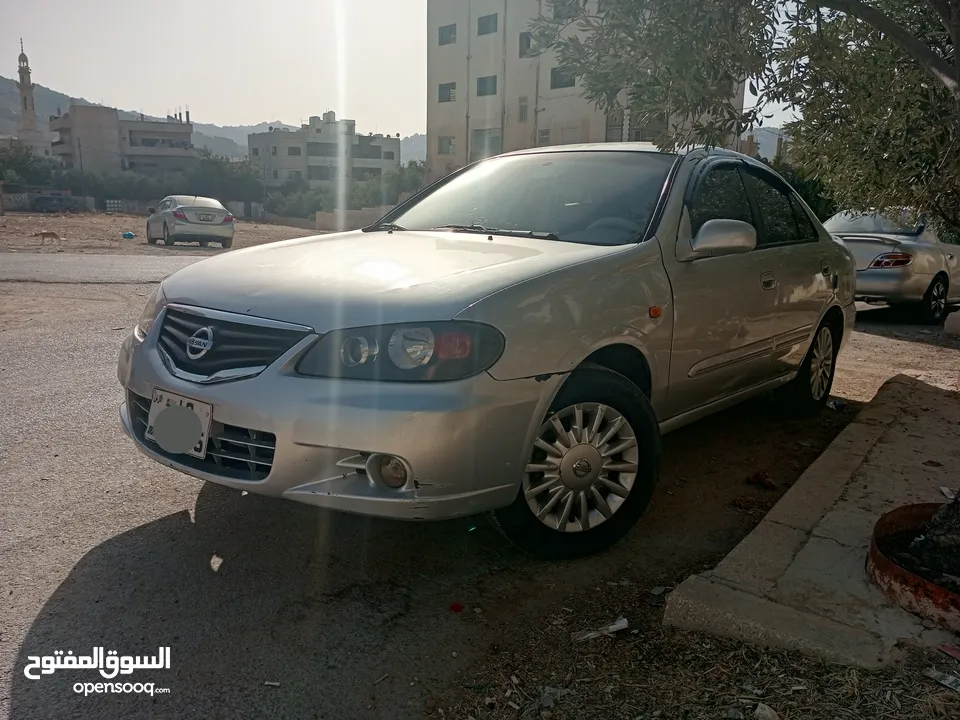 نيسان صني ياباني 2001 محدثة 2012  فل اوتوماتيك عدا الفتحة لون سلفر