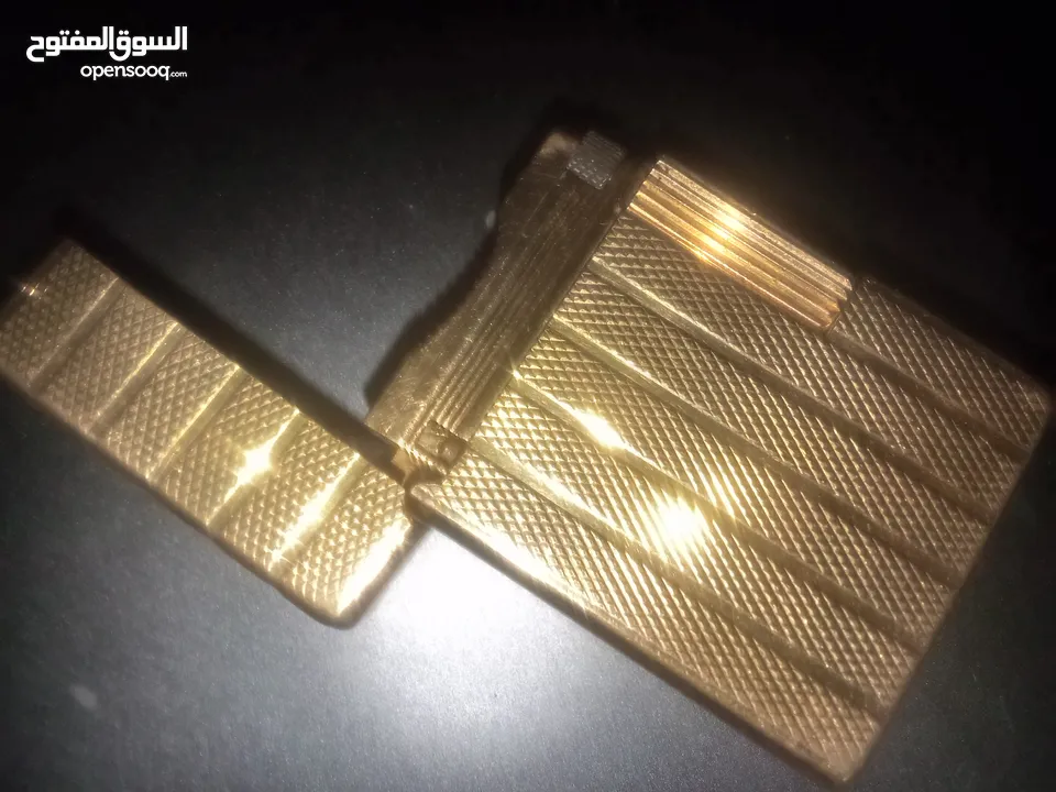 قداحه اصلي طلاء ذهب عمرها صنعت من سنه ال ثمانين إلى التسعين 1980 رقم التسلسلي للقداحه F2c927 sGDuro