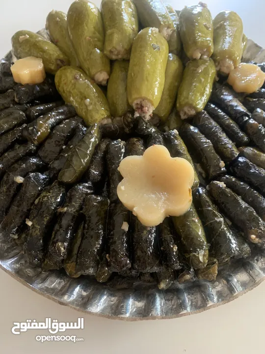 خروف مشوي او محشي او محشي ورق عنب دوالي