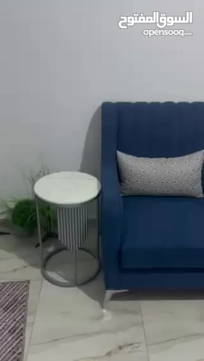 طقم كنب كحلي اللون