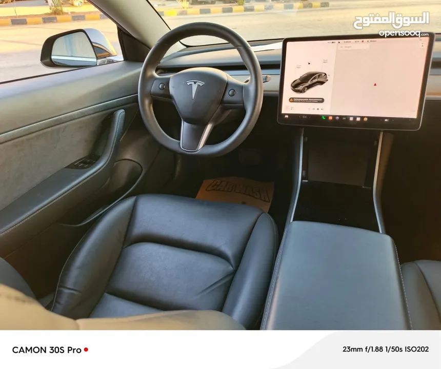 Tesla model 3 2022 standard plus/7 جيد / اتوسكور A/ عداد قليل كاش وبالاقساط