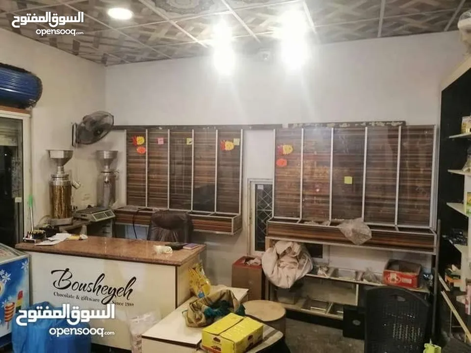 اثاث سوبر ماركت كامل مع مطاحن قهوة عدد 2 مطاحن القدس بحالة الوكاله