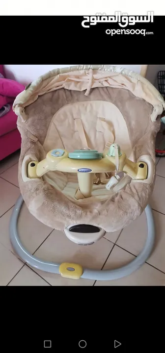 A 4 year old baby swing used but it works well. It works with electricity and it has a transformer f