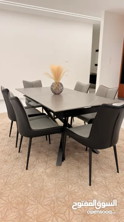 طاولة سفرة مودرن/ سيراميك كراسي جلد قوي وسميك