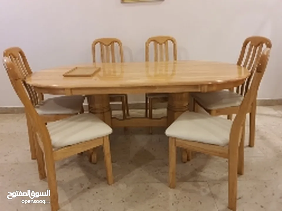 6 seater dining table,  6 Chairs and  Cupboard very elegant