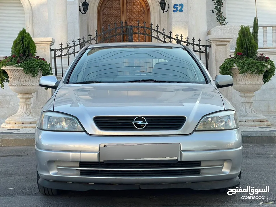 ‎أوبل استرا موديل 2001  وارد الوكالة ومالك واحد فقط من الشركة عداد 100الف كيلو فقط