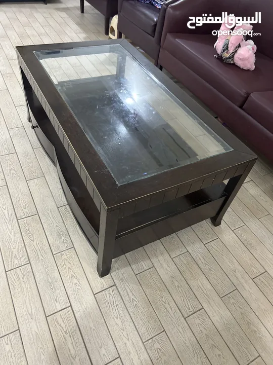 Glass top coffee table wooden