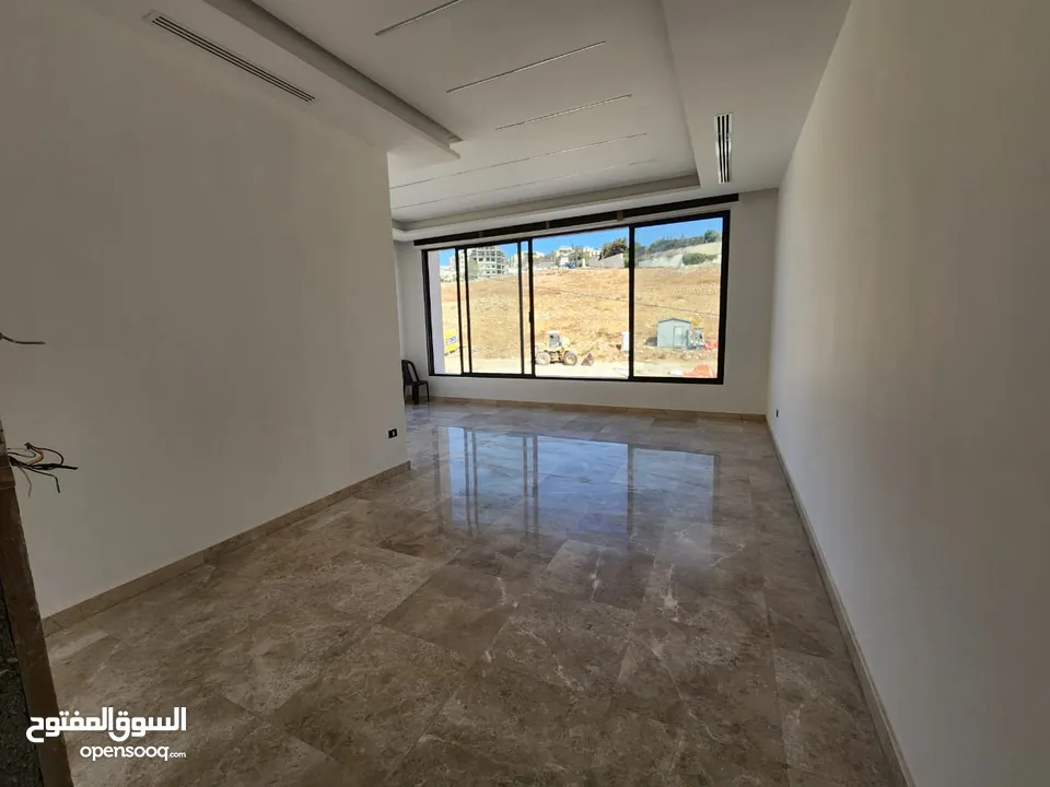 شقة أرضية مميزة في عبدون للبيع بموقع حيوي   الرقم المرجعي : 14199