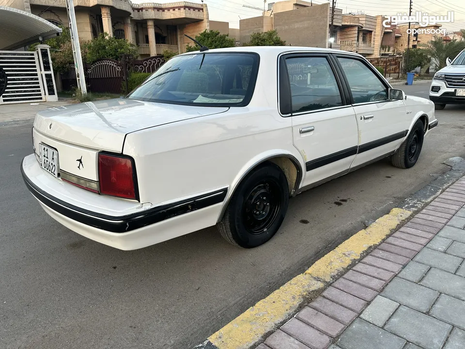 اولدز 1990 ابيض رقم بغداد دولي