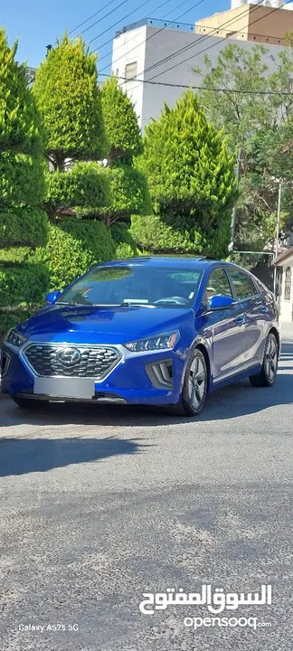 هونداي أيونيك 2021 لون ازرق ميتالك فل كامل اعلى صنف Limited مع فتحة فحص كامل جمرك جديد