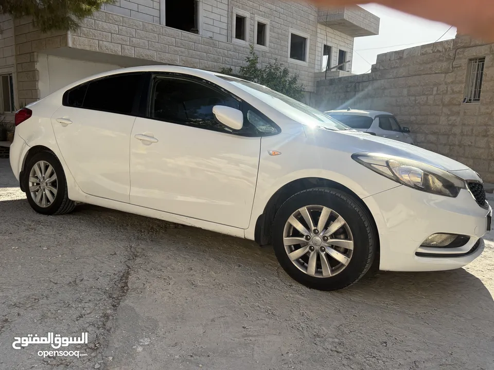 كيا سيراتو k3 ماتور 1600 نخب موديل 2014 مع فتحة سقف